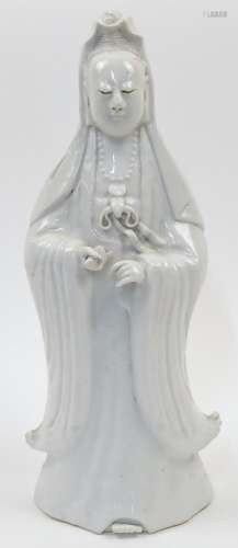 A Chinese Dehua porcelain figure of Guanyin, 19th century, m...