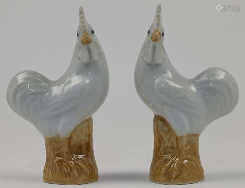 A pair of Chinese porcelain models of roosters, Republic per...