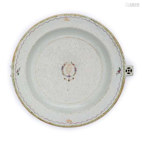 A Chinese export famille rose warming plate, Qing dynasty, 1...