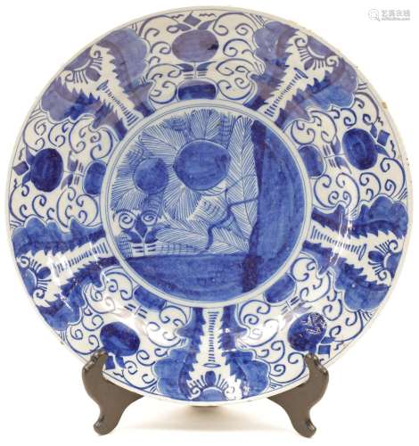 A Dutch Delftware blue and white charger, 18th / 19th centur...