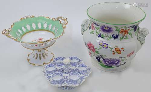A Minton porcelain Chinoiserie set of six egg cups and stand...