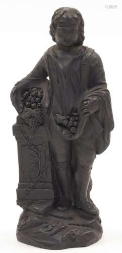 A black basalt figure of a youthful man, possibly Wedgwood, ...