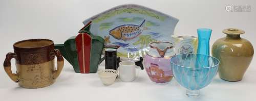 A mixed selection of traditional and modern ceramics and gla...