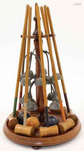 An Edwardian table top croquet set, early 20th century, comp...