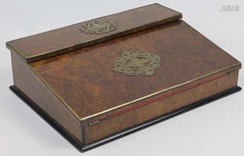 A walnut veneered oak writing slope, 19th century, the lid a...