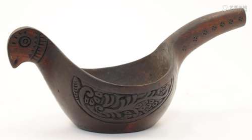 A Scandinavian carved wood ale cup, 20th century, in the for...