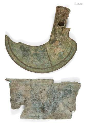 A bronze socketed sickle, Late Bronze Age, circa 1200-800 B....