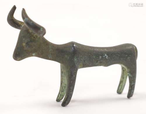 A Greek archaic style bronze figure of a bull, not ancient, ...