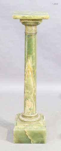 A green onyx column, 20th century, with gilt metal mounts, 1...