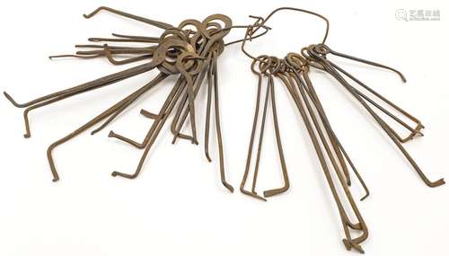 A collection of iron thirty-two skeleton keys, 19th century ...