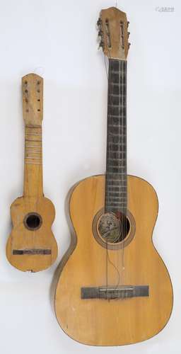 A Spanish acoustic guitar, with label for Hijos de Vicente T...