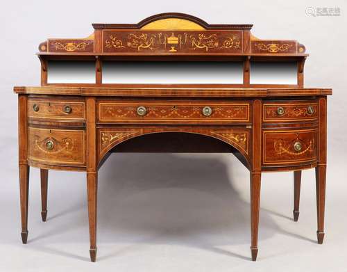 A George III inlaid mahogany sideboard, in the Sheraton styl...