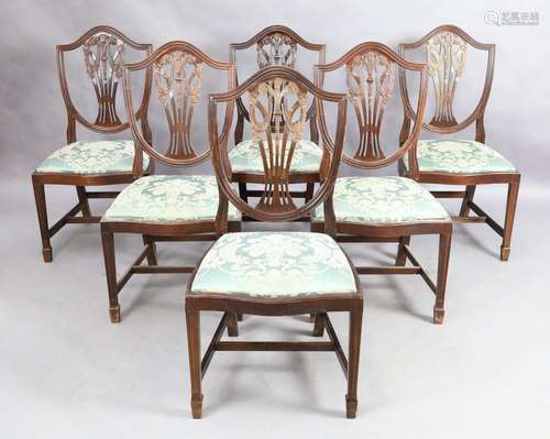 A set of six English mahogany dining chairs, Hepplewhite sty...