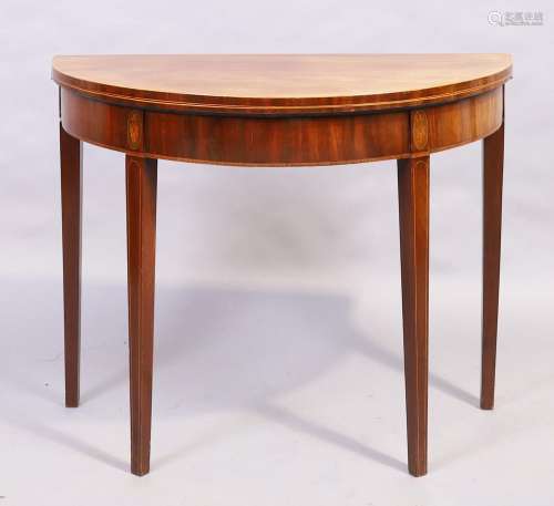 A George III inlaid mahogany demi lune tea table, last quart...