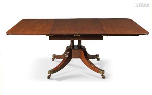 A Regency mahogany extending dining table, by Thomas Butler,...