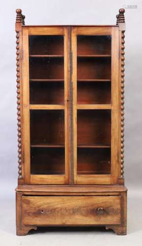 An early Victorian mahogany glazed cabinet, second quarter 1...