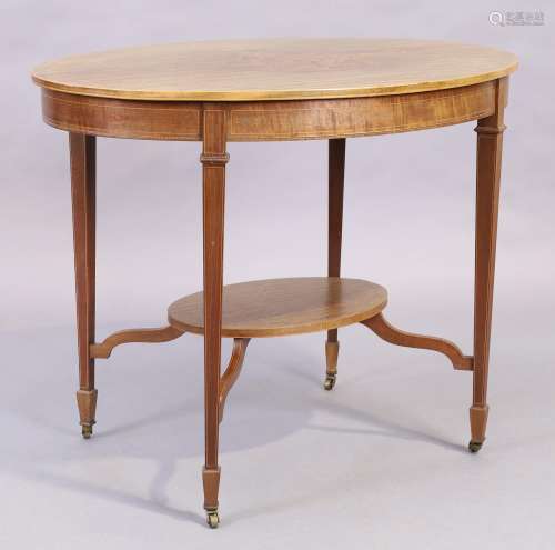 An Edwardian mahogany and line inlaid oval occasional table,...
