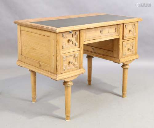 A pine kneehole desk, 20th century, with green leather writi...