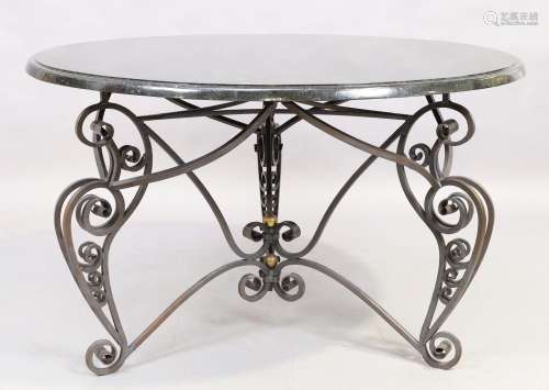 Maitland Smith, a wrought iron centre table, the circular to...