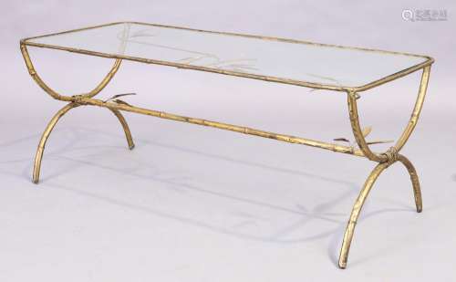 A French gilt metal faux bamboo coffee table with glass top,...