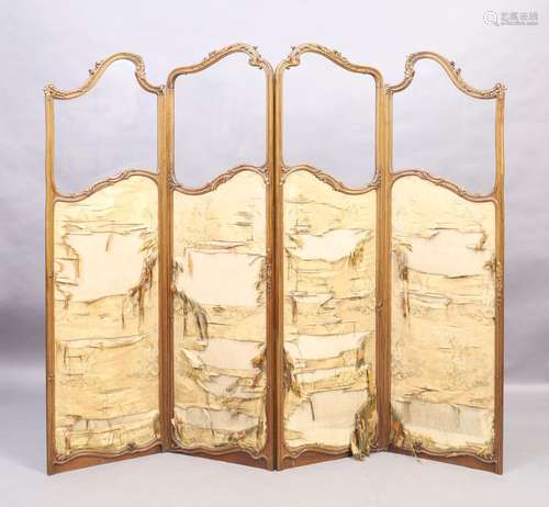 A French parcel gilt carved walnut four fold screen, last qu...