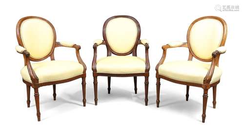 A set of three French mahogany fauteuils, in the Louis XVI s...