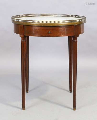 A French circular mahogany centre table, Louis XVI style, 20...