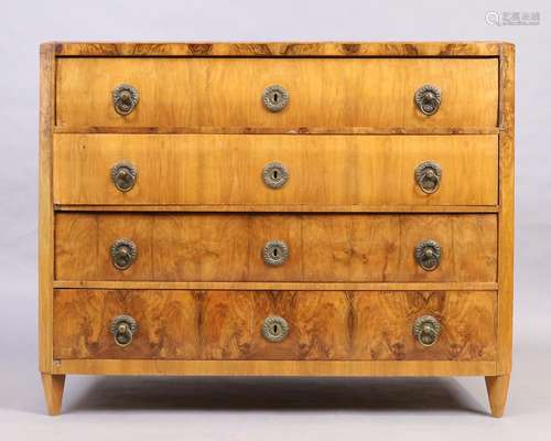 A Biedermeier walnut chest, first quarter 19th century, with...