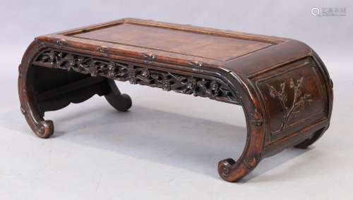 A Chinese Hongmu Kang low table, late 19th century, the scro...