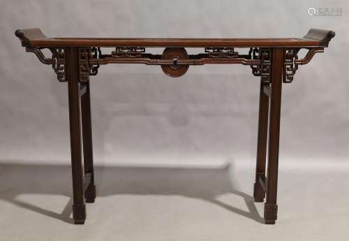 A Chinese hardwood altar table, 20th century, carved and pie...