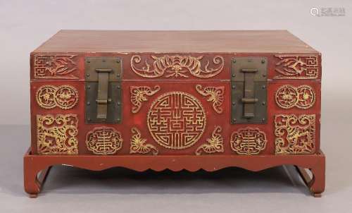 A Chinese painted and lacquered leather trunk on stand, firs...