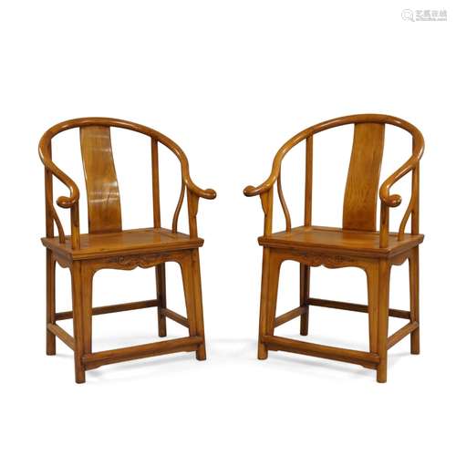 A pair of Chinese horseshoe-back wood chairs, quanyi Late Qi...