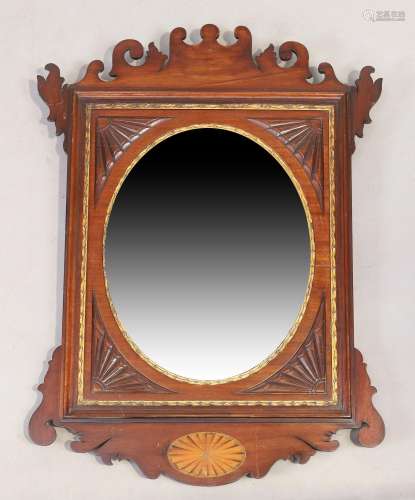 An English fret work mirror, George III style, first quarter...
