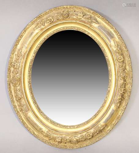 A small Victorian oval mirror, last quarter 19th century, th...
