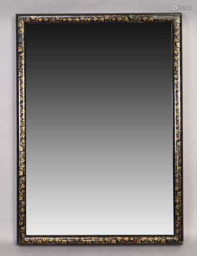An English black lacquered mirror, last quarter 19th century...