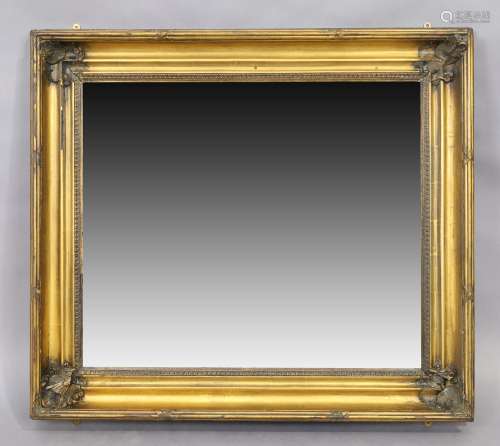 An English giltwood mirror, 20th century, the moulded frame ...