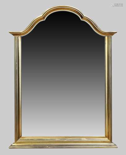 A modern gilt mirror with arched top, 107cm x 82cm