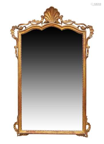 A French giltwood mirror, last quarter 19th century,the shap...