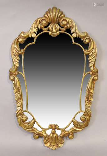 A French gilt wood mirror, third quarter 20th century, the m...