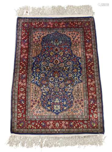 A Hereke silk rug, third quarter 20th century,the central me...