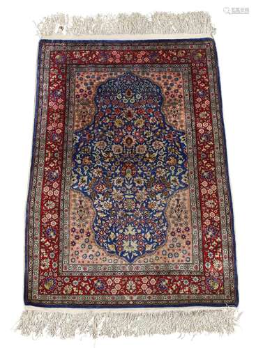 A Hereke silk rug, third quarter 20th century,the central me...