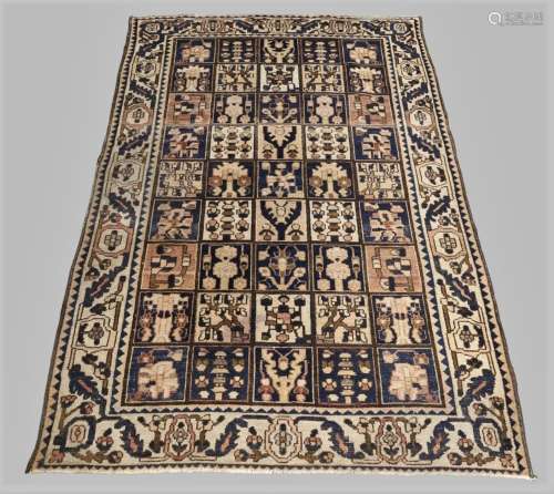 A Persian Bakhtiari rug, 20th century, the central tiled des...