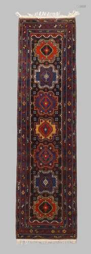 A Persian Hamadan runner, third quarter 20th century, the ce...