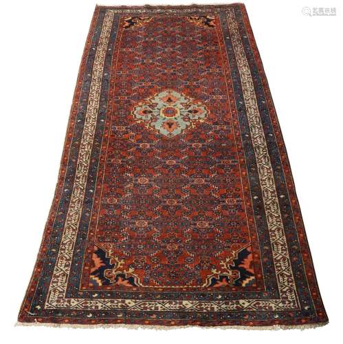 A Persian Feraghan wool rug, first quarter 20th century, cen...
