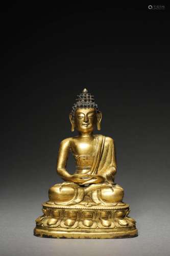 A QING GILT-BRONZE FIGURE OF BUDDA