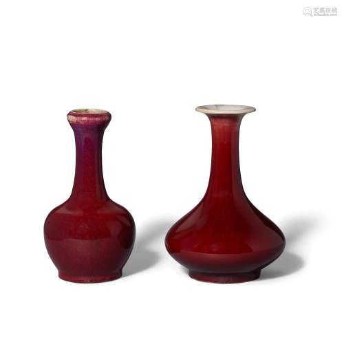 TWO COPPER-RED-GLAZED BOTTLE VASES 19th century/late Qing dy...