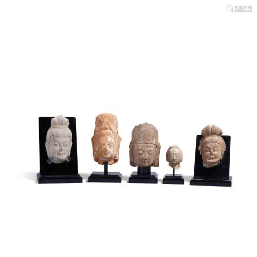 A GROUP OF FIVE BODHISATTVA HEADS Northern Wei (386-585) - S...