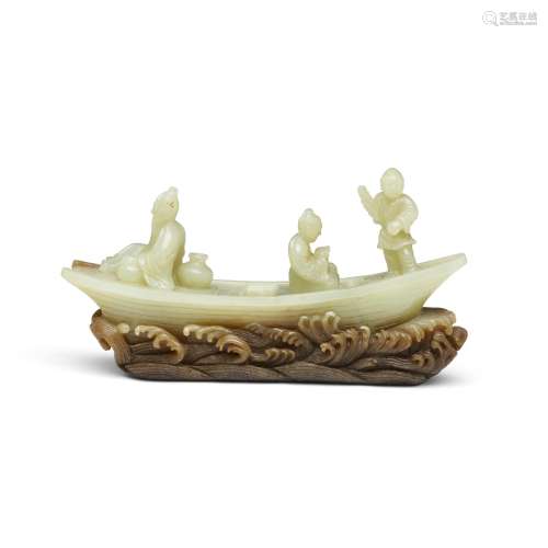 A CELADON AND RUSSET JADE CARVING OF FIGURES IN A BOAT Late ...