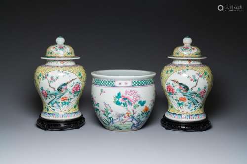 A pair of Chinese famille rose covered vases and a jardinièr...