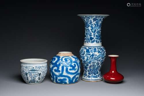 Three Chinese blue and white vases and a monochrome red vase...